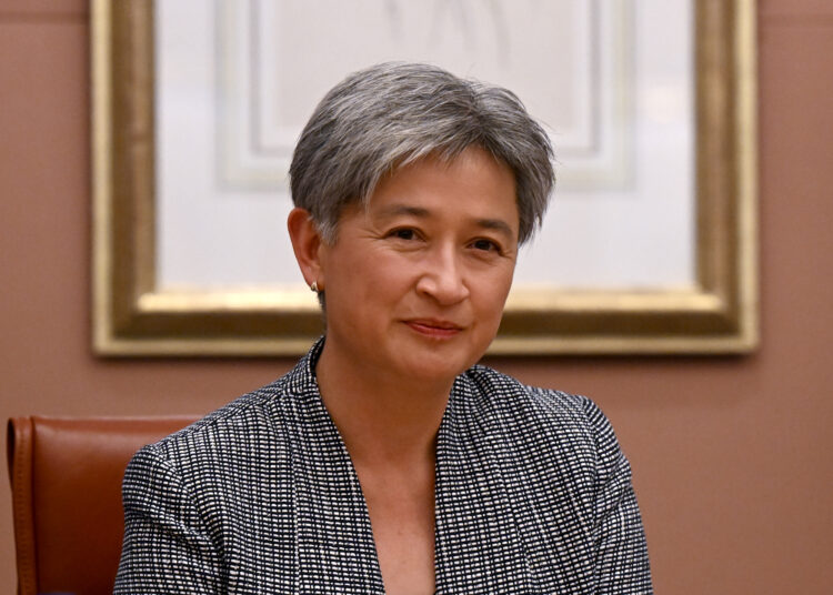 Australia's Foreign Minister Penny Wong attends a meeting with Singapore's Prime Minister Lee Hsien Loong at Parliament House in Canberra on October 18, 2022. (Photo by LUKAS COCH / POOL / AFP)