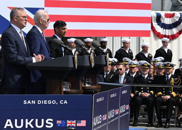 US President Joe Biden (2nd L), British Prime Minister Rishi Sunak (R) and Australian Prime Minister Anthony Albanese (L) hold a press conference during the AUKUS summit on March 13, 2023, at Naval Base Point Loma in San Diego California. - AUKUS is a trilateral security pact announced on September 15, 2021, for the Indo-Pacific region. (Photo by Jim WATSON / AFP)