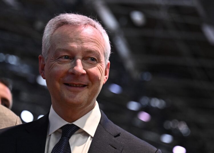 le France's Minister for Economy and Finances Bruno Le Maire (c) visits the Vivatech technology start-ups and innovation fair, at the Porte de Versailles exhibition center in Paris, on May 22, 2024. (Photo by JULIEN DE ROSA / AFP)