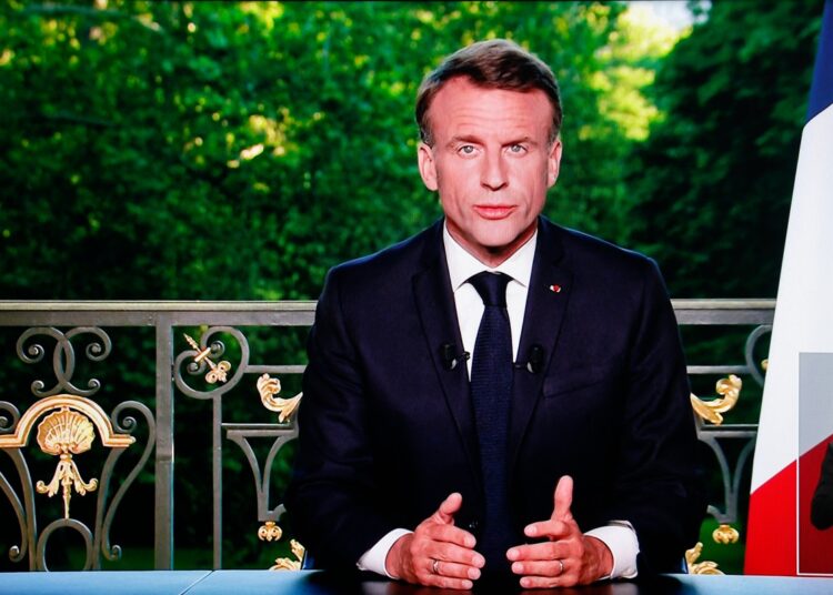 This screen shot shows France's President Emmanuel Macron speaking during a televised address to the nation during which he announced he is dissolving the National Assembly, French Parliament lower house, and calls new general elections on June 30, in Paris on June 9, 2024. (Photo by Ludovic MARIN / AFP)